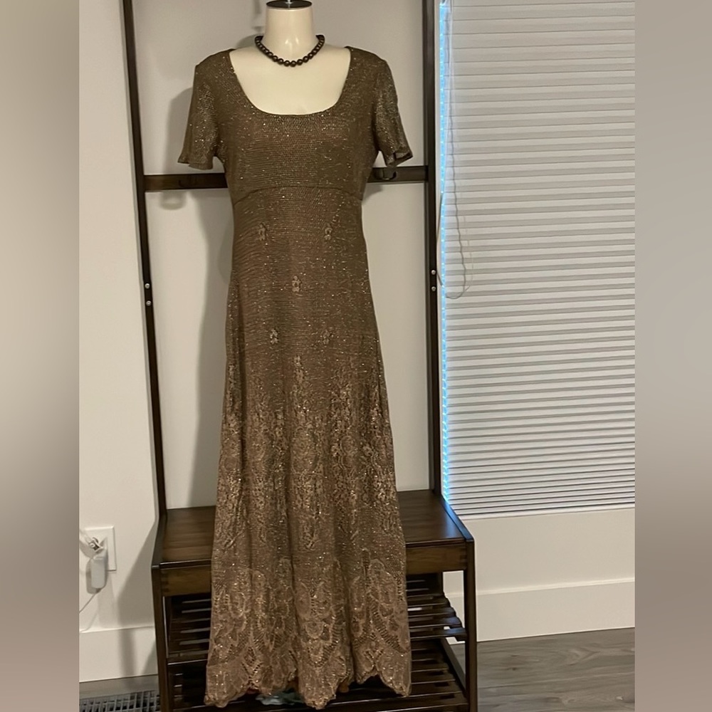 Beautiful Metallic Brown Knitted fully lined gown with scalloped edges.